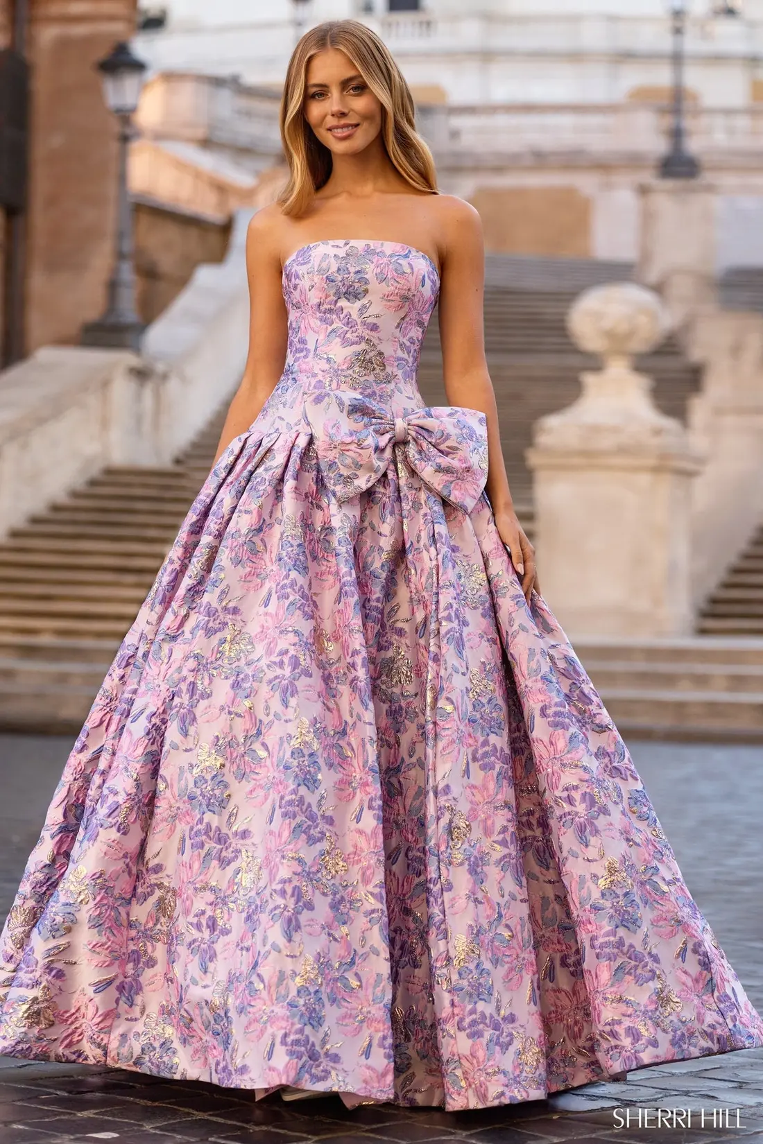 Pink and purple floral jacquard ball gown at The Castle Prom and Bridal