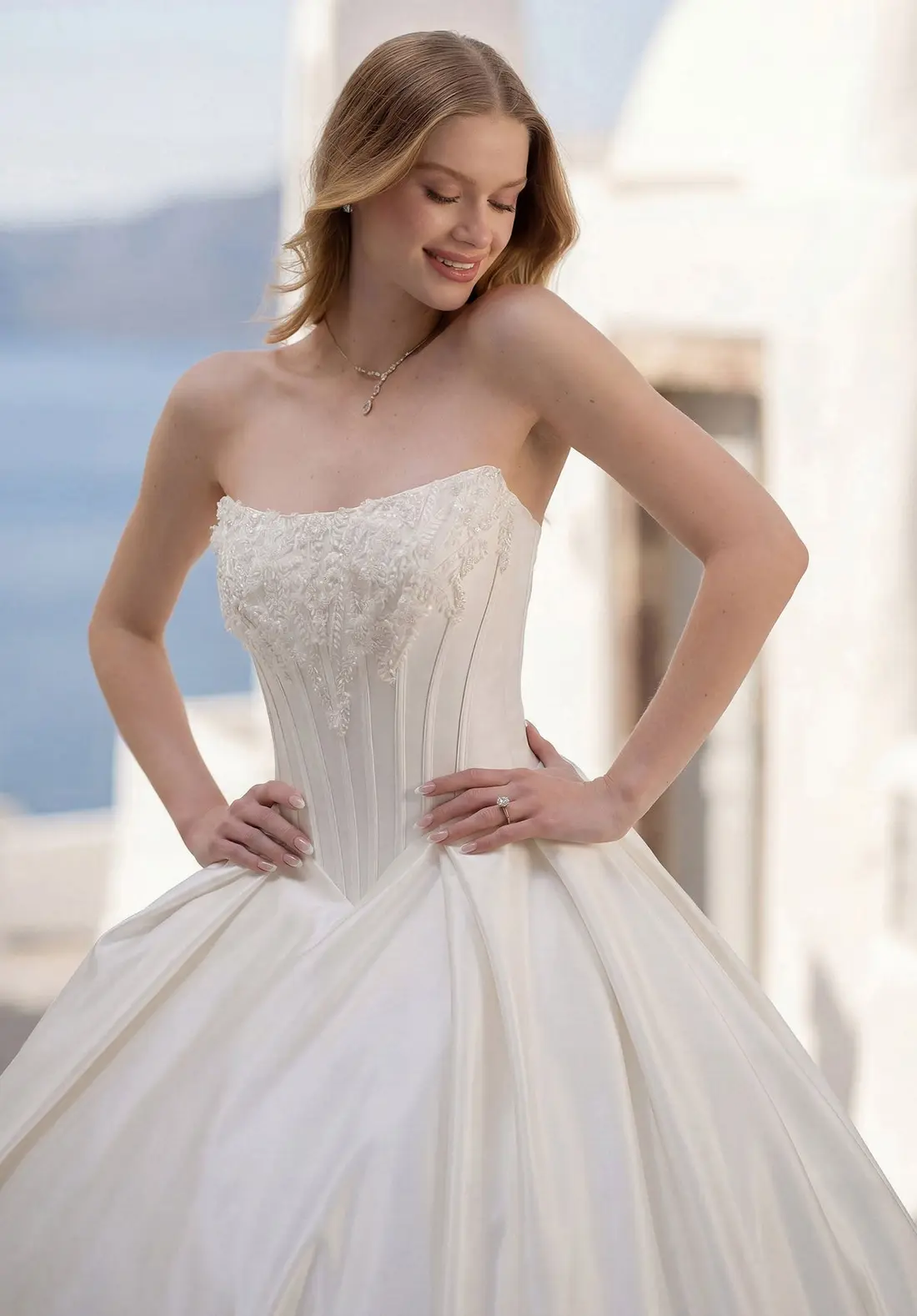 Strapless beaded corset ball gown at The Castle Prom and Bridal